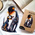 Familie de pinguini care se îmbrățișează - Puzzle din lemn 4